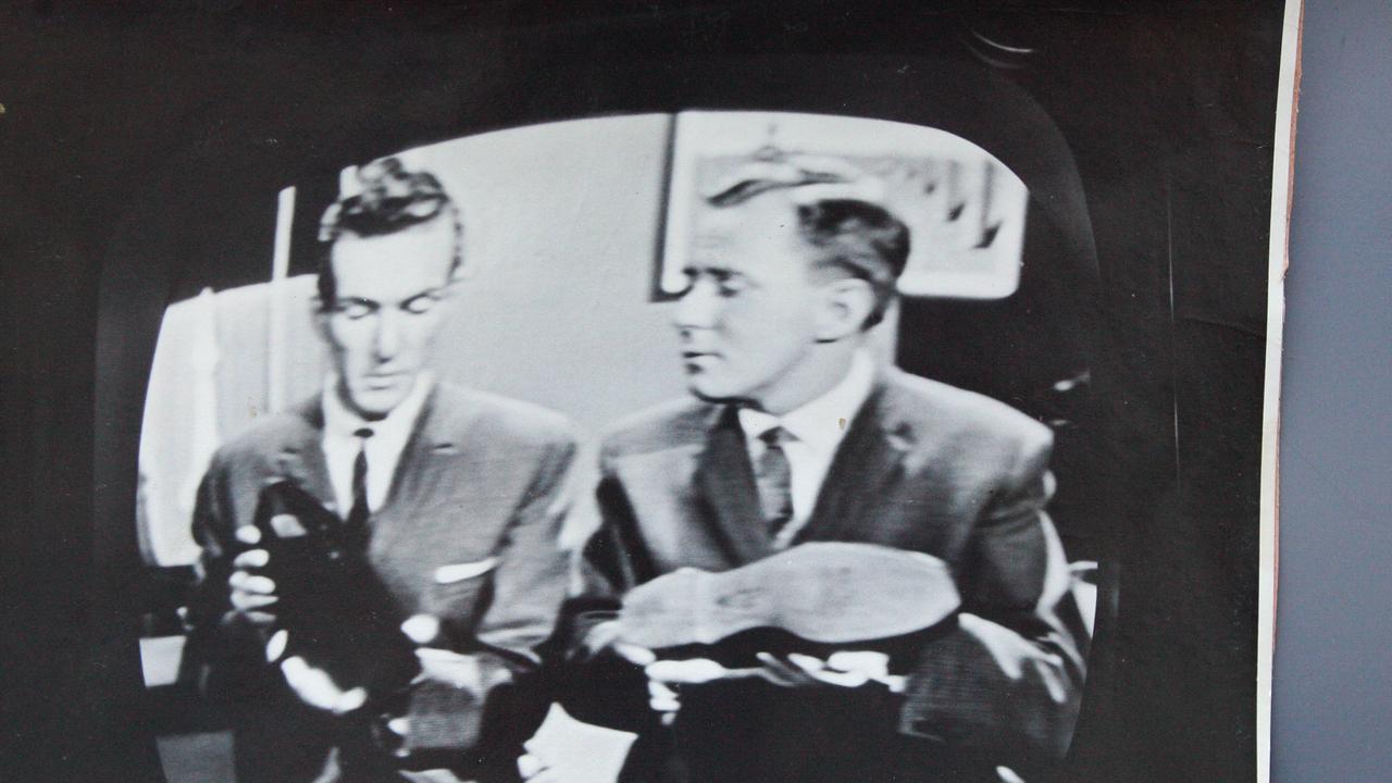 Hugh Cornish, on the right, was the first man on Queensland television and was called back in 2013 to turn off analog television service.