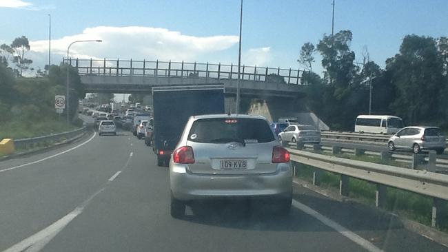 M1 School pick up peak hour Reedy Creek exit onto M1 northbound.