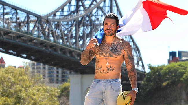 Departing Queensland Reds star Digby Ioane with a french flag at Kangaroo Point. Pic Annette Dew