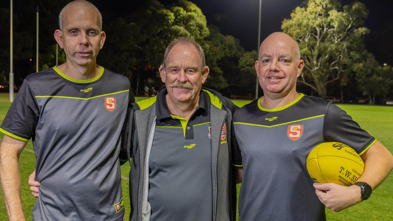 SANFL umpires boss Shane Harris (middle) with senior umpires Corey Bowen (left) and Matt Cummins. Picture: Ben Clark