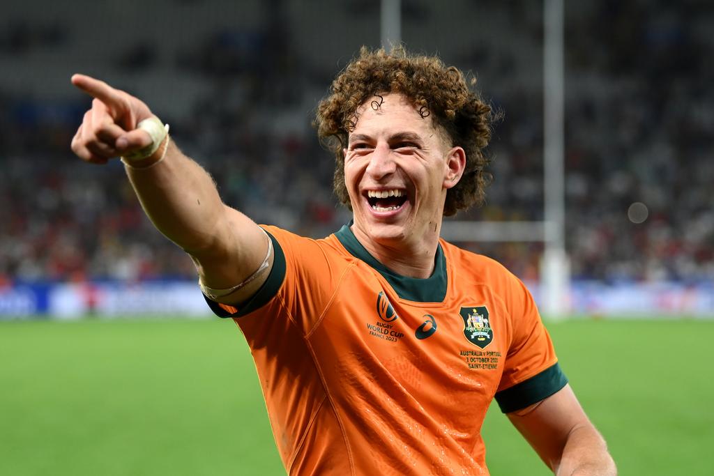 SAINT-ETIENNE, FRANCE - OCTOBER 01: Mark Nawaqanitawase of Australia celebrates victory at full-time following the Rugby World Cup France 2023 match between Australia and Portugal at Stade Geoffroy-Guichard on October 01, 2023 in Saint-Etienne, France. (Photo by Stu Forster/Getty Images) *BESTPIX*