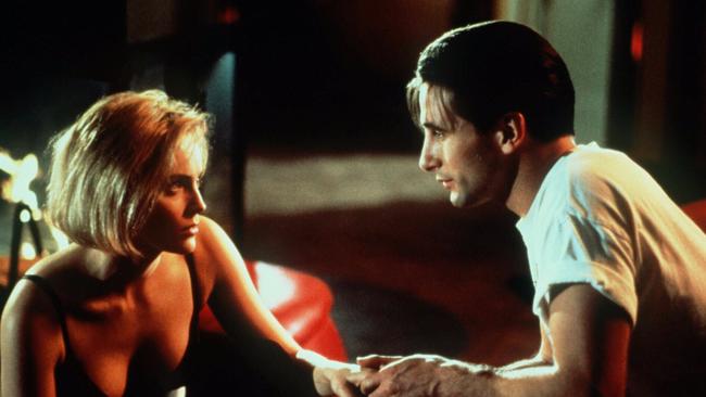 Billy Baldwin and Sharon Stone in Sliver.