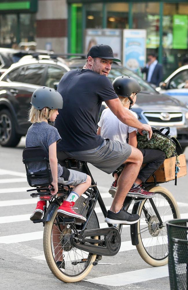 Liev Schreiber is seen balancing his two sons, Alexander and Samuel, during a bike ride in New York City. Picture: Peter Cepeda/INFphoto.com
