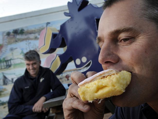 Barry Gregg, the 2010 winner of the amateur section of the Ouyen Vanilla Slice Competition, tries one from the local bakery.