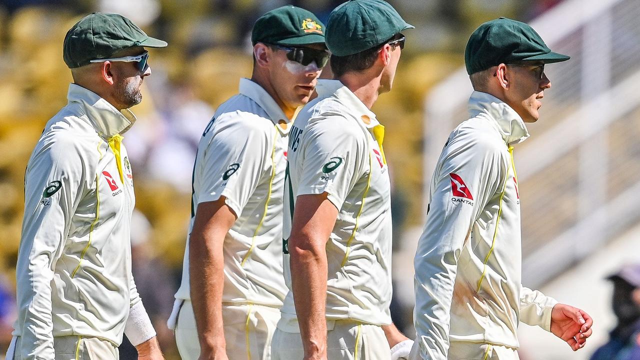 Australians leave the field in Nagpur after the first Test against India . (Photo by Indranil MUKHERJEE / AFP)