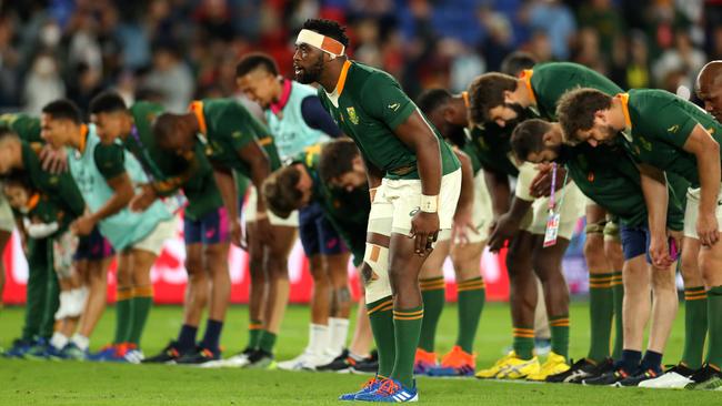 Siya Kolisi leads the South African players in an acknowledgment of the crowd before the semi-final against Wales in Yokohama. Picture: Getty Images