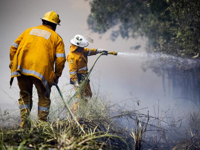 Fire crews battle bushfires at Little Mountain on the Sunshine Coast. Picture: Lachie Millard