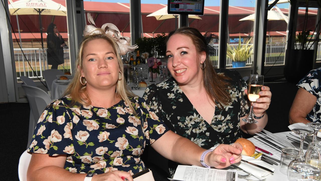 Kim Baker and Jessica Ling at the Darwin Turf Club Bridge Toyota Ladies' Day / Derby Day. Picture: KATRINA BRIDGEFORD