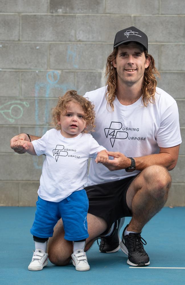 Geelong dad Cam Young with son Iggy who was diagnosed with cerebal palsy shortly after he was born. Picture: Brad Fleet