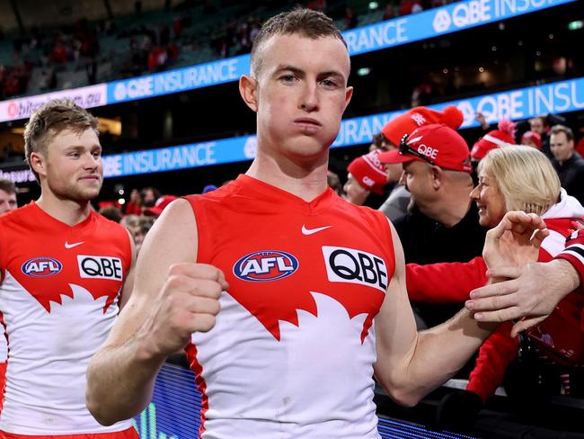 SYDNEY, AUSTRALIA - AUGUST 09: Chad Warner of the Swans celebrates with fans at full-time during the round 22 AFL match between Sydney Swans and Collingwood Magpies at SCG, on August 09, 2024, in Sydney, Australia. (Photo by Brendon Thorne/AFL Photos/via Getty Images)