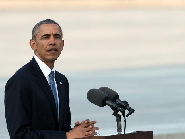 US Barack Obama delivers a speech at the Hiroshima Peace Memorial park cenotaph in Hiroshima.