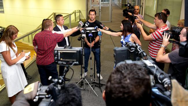 Mitchell Pearce greeted by his parents Terri and Wayne upon arriving at Sydney Airport after a stint in rehabilitation. Picture: Gregg Porteous