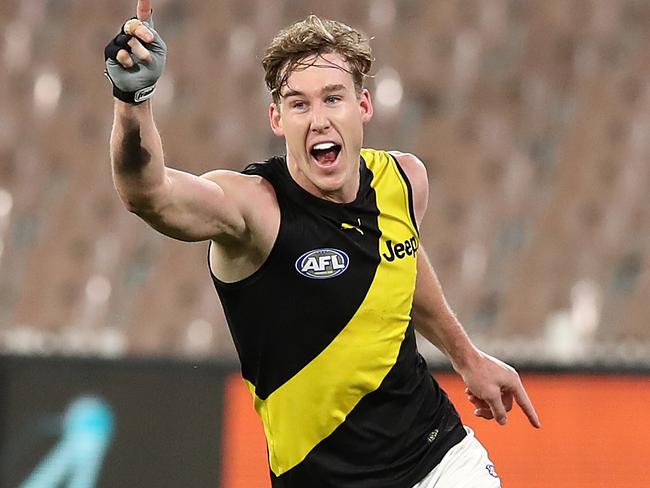 MELBOURNE, AUSTRALIA - JULY 05: Tom J. Lynch of the Tigers celebrates kicking a goal during the round 5 AFL match between the Melbourne Demons and the Richmond Tigers at Melbourne Cricket Ground on July 05, 2020 in Melbourne, Australia. (Photo by Graham Denholm/AFL Photos via Getty Images)