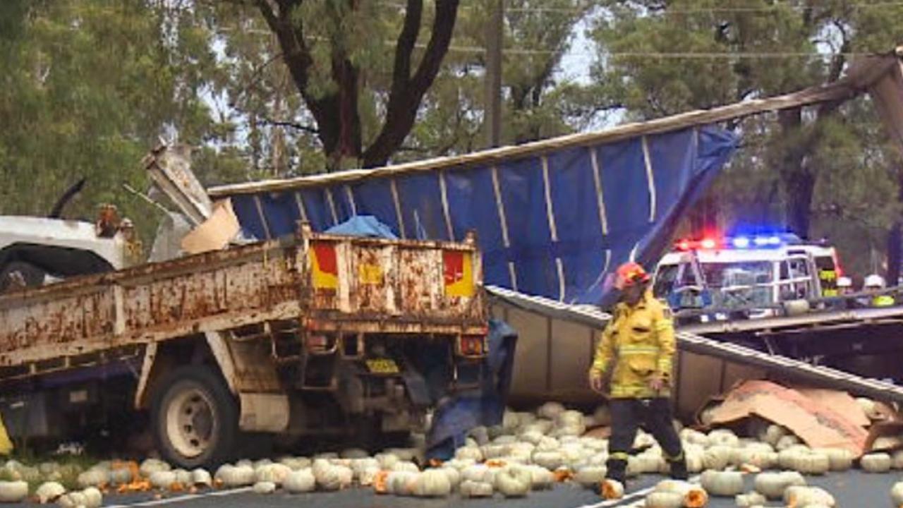 A large truck and smaller truck collided.