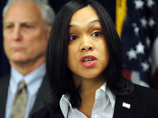 Criminal charges ... Marilyn Mosby, right, Baltimore City State’s Attorney.  Picture:  AP