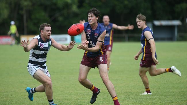 Pictured (l-r): Crocs captain Ben Mcphee and Lions midfielder Daniel Charlesworth. Cairns City Lions v Port Douglas Crocs at Holloways Beach. AFL Cairns 2024. Credit: Gyan-Reece Rocha