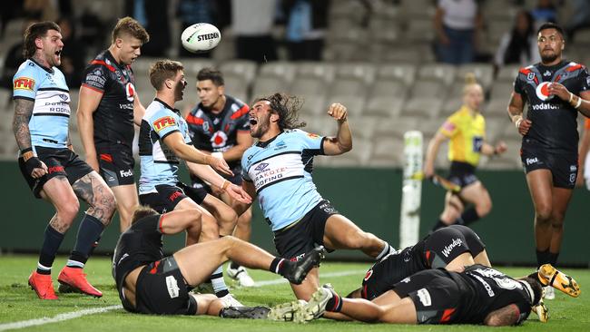 Cronulla’s Toby Rudolf celebrates a try against the team he turned his back on