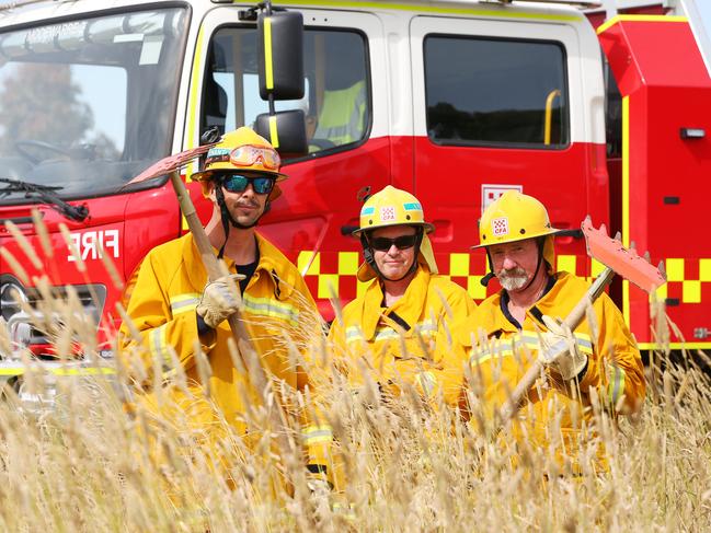 Firefighters Ashley McPhee, Ross Johnson and Neil Hickman from Modewarre CFA. The CFA are warning of high fire risk due to strong growth and hot weather. Picture: Alan Barber