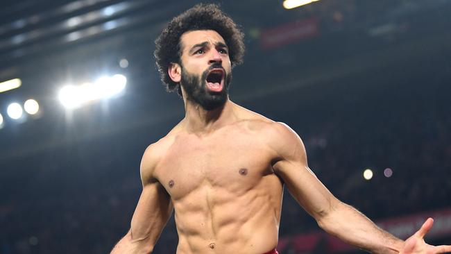 Mo Salah ripped off his shirt after scoring the goal to clinch Liverpool’s win over Manchester United. Picture: Michael Regan/Getty Images