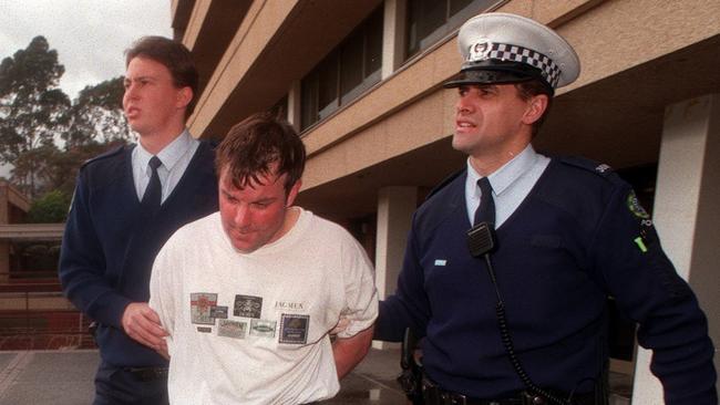 Maddeford, centre, in 1997 when he was arrested following his “inept” armed robbery.