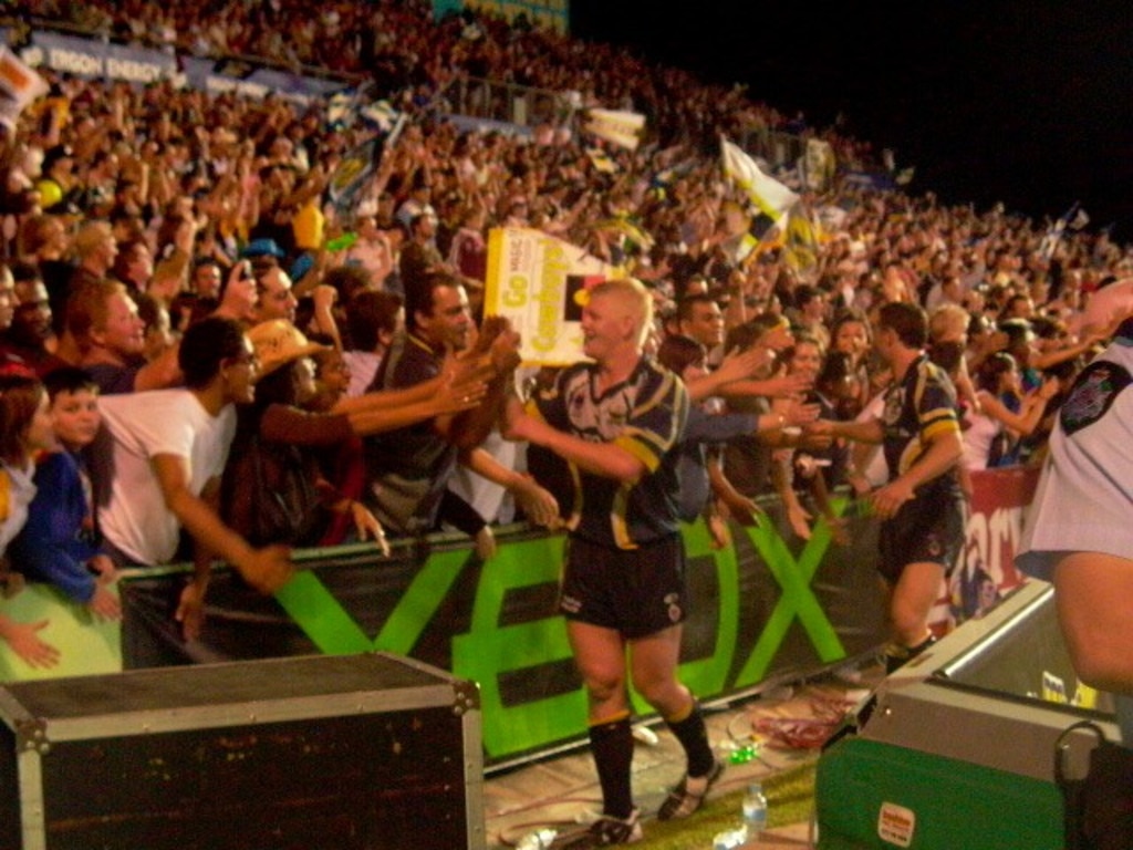 Cowboys players meet with their fans after winning the match 10-0.