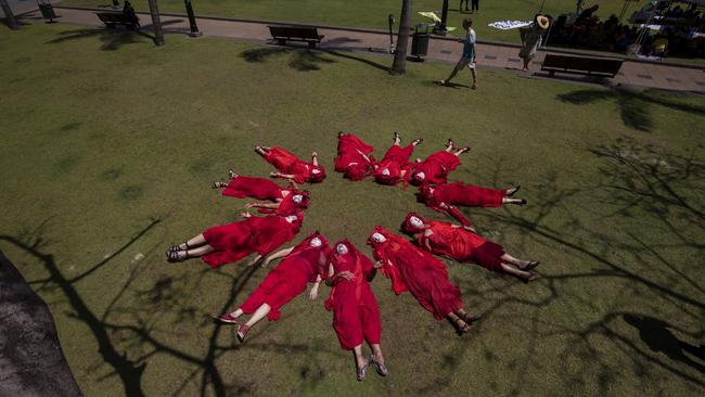 The Red Rebel Brigade activists from Extinction Rebellion on Tuesday. Picture: AAP Image/Glenn Hunt