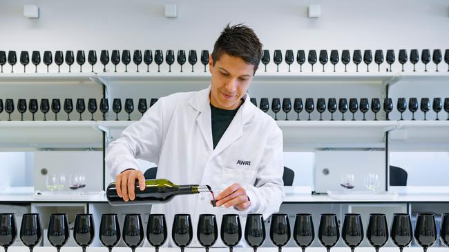 Inside the sensory laboratory at The Australian Wine Research Institute on the Waite Campus at Urrbrae, let Damian Espinase Nandorfy pour you a drop of red. Picture: Jacqui Way Photography