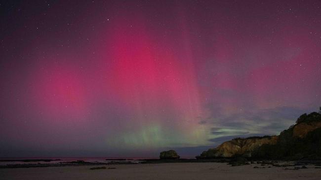 The Southern Lights over Torquay beach on Monday. Picture: Shaun Viljoen