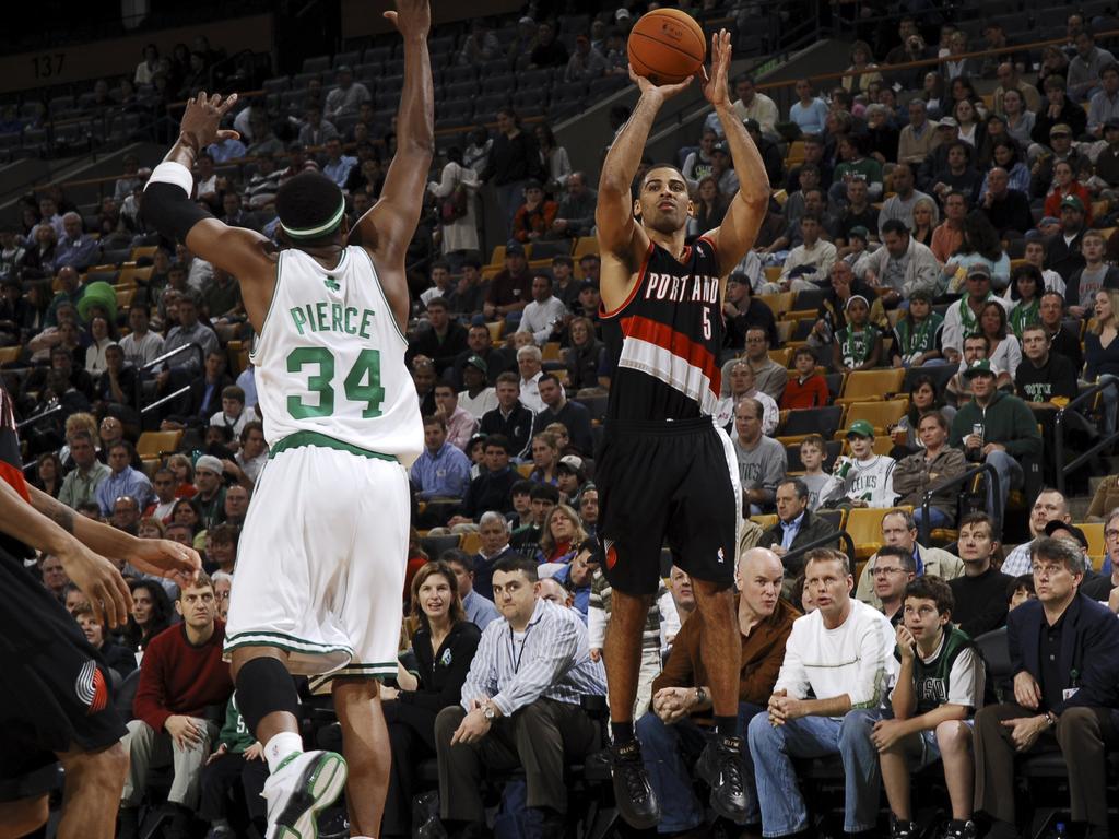 Ime Udoka takes a shot over Paul Pierce during a game in 2006. Picture: Brian Babineau/NBAE via Getty Images