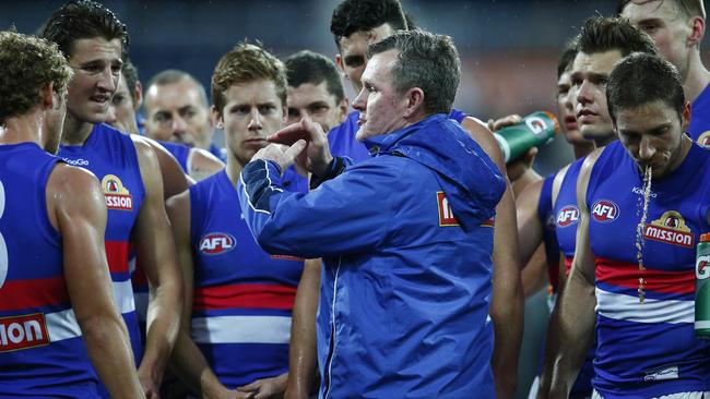 Brendan McCartney talks to his Western Bulldogs players in 2014. Picture: Michael Klein