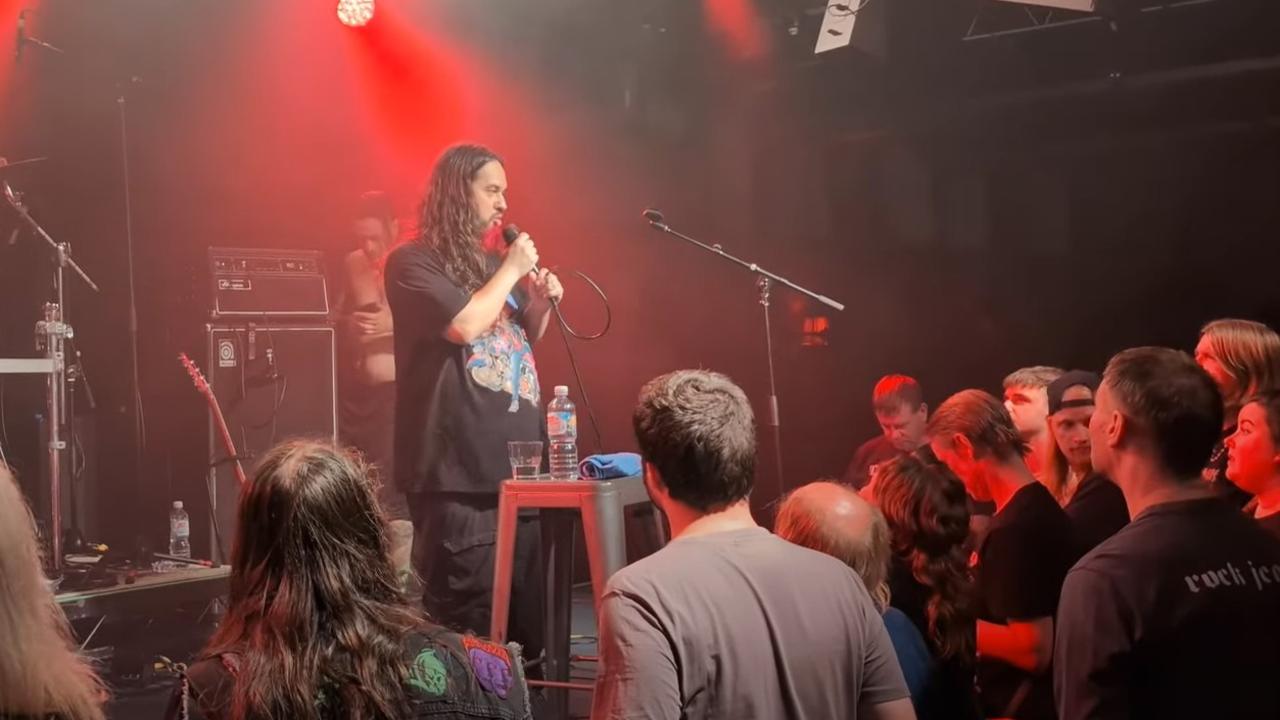 A band member tells the Adelaide crowd Di’Anno was sorry for cutting the gig short. Picture: YouTube