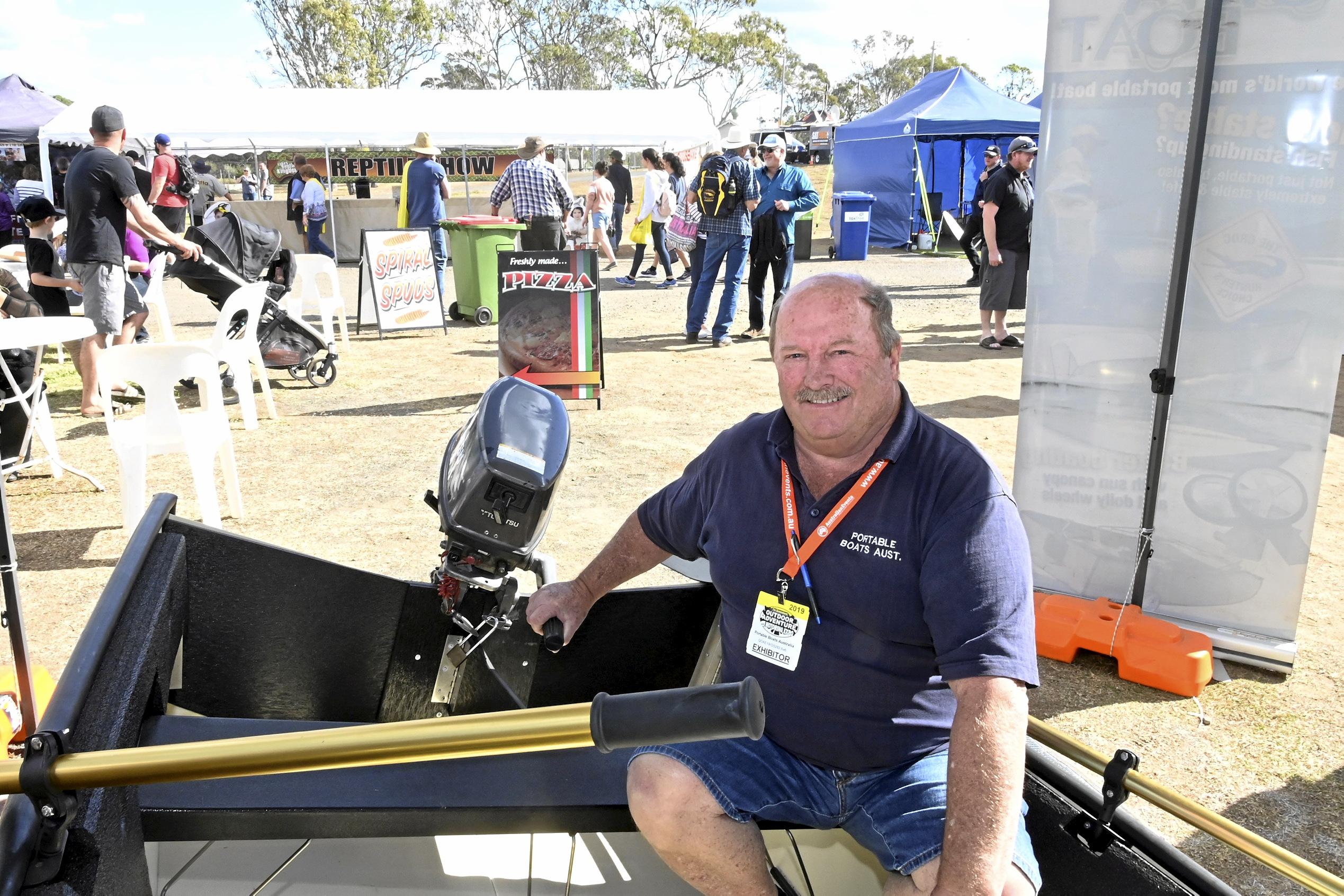 Colin Robinson of Portable Boats Australia demonstrates the fold up dingy at the Queensland Outdoor Adventure and Motoring Expo at the Toowoomba Showgrounds. August 2019. Picture: Bev Lacey