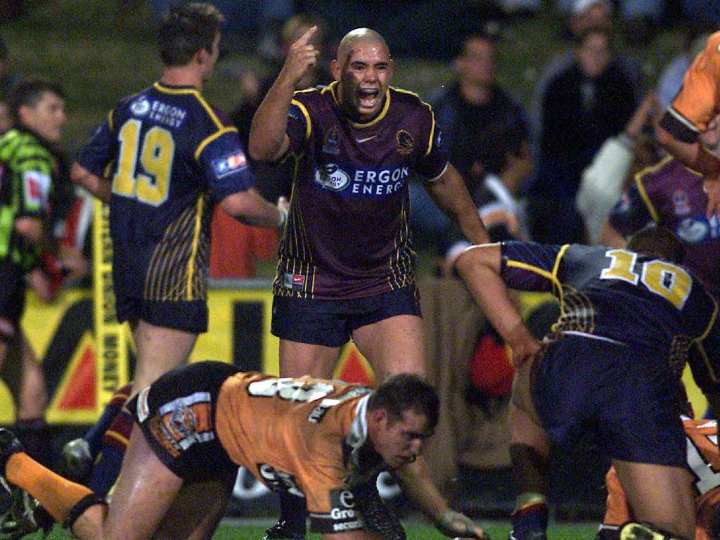 Corey Parker celebrates the final try and impending victory of the ‘Baby Broncos’ over Wests Tigers in 2002. Picture: Brett Costello