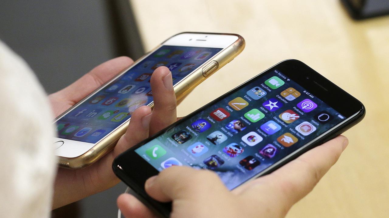 Previously iPhones were restricted to running iOS, until now. Picture: AP Photo / Kiichiro Sato