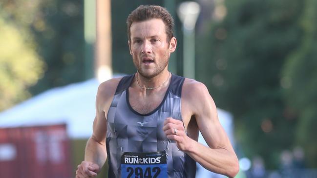 Long run men's 3rd place Craig Mottram crosses the line in the Run for the Kids on Sunday, March 20, 2016, in Melbourne, Victoria, Australia. RFTK2016 Picture: Hamish Blair