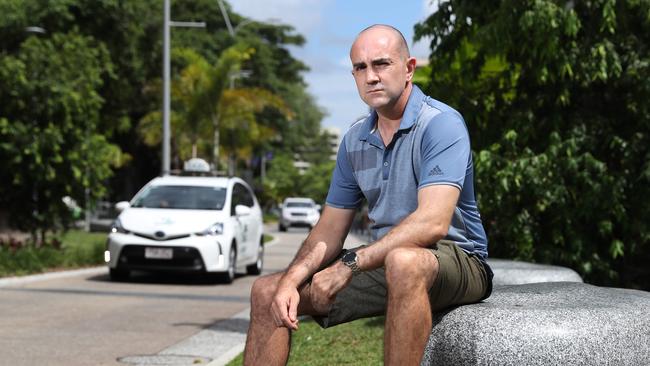 After spending $28m upgrading the Esplanade outdoor dining precinct, Cairns Regional Council is considering closing it to vehicle traffic. Churro Time owner Daniel Rhodes has seen close calls of children running onto the Esplanade roadway after playing on the rocks outside his eatery. Picture: Brendan Radke