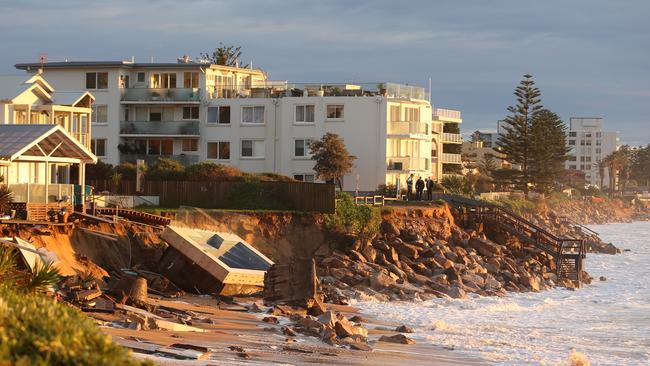 The Collaroy beach front has gone taking with it property's and possessions, this happened last night during the storms. pic John Grainger