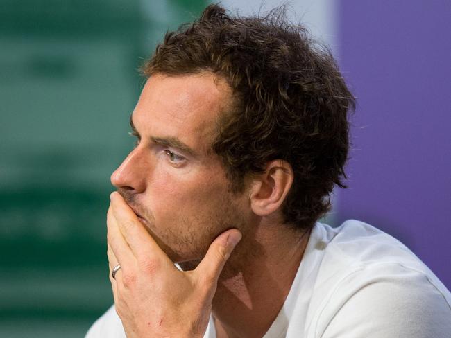 Britain's Andy Murray attends a press conference at The All England Tennis Club in Wimbledon, southwest London, on July 12, 2017, after losing his men's quarter-final match against US player Sam Querrey.  Querrey won 3-6, 6-4, 6-7, 6-1, 6-1. / AFP PHOTO / POOL / AELTC AND AELTC/Joe Toth / Joe TOTH