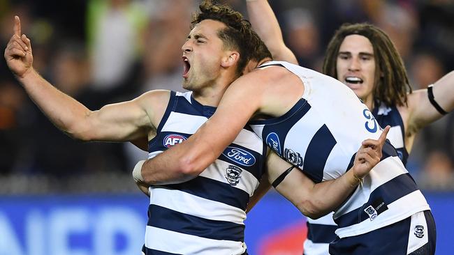 Luke Dahlhaus celebrates a goal during the Cats’ stunning win over the Eagles. Picture: Getty Images