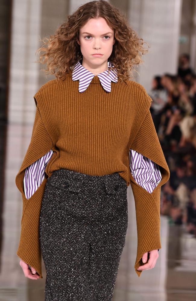 Rugged up! A model wearing Victoria Beckham’s latest range at London Fashion Week. Picture: AFP