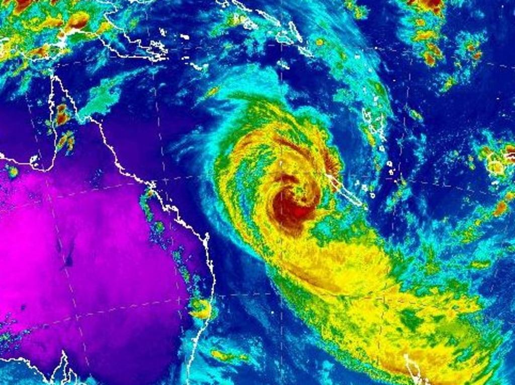 The unpredictable category two storm system is heading slowly towards Australia, threatening torrential rainfall, beach erosion and flooding. 