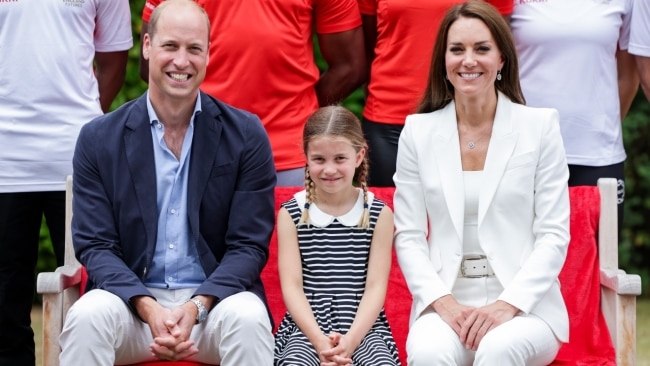Prince William, Princess Charlotte and Catherine, Duchess of Cambridge smile during a visit to SportsAid House. Picture: Getty Images