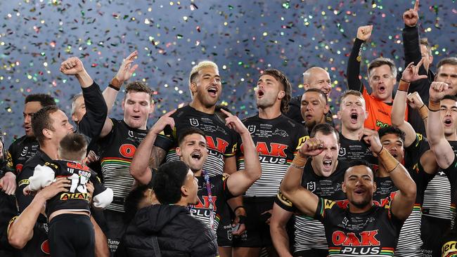 The Panthers celebrate with the NRL Premiership Trophy.