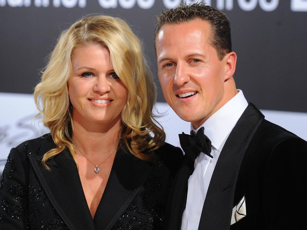 Formula-One driver Michael Schumacher and his wife Corinna. AFP PHOTO / JENS KALAENE.