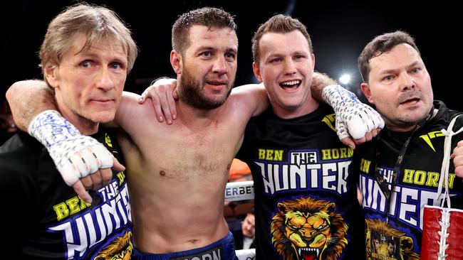 Ben Horn poses with brother Jeff Horn and his support team after the fight. Picture: Getty Images