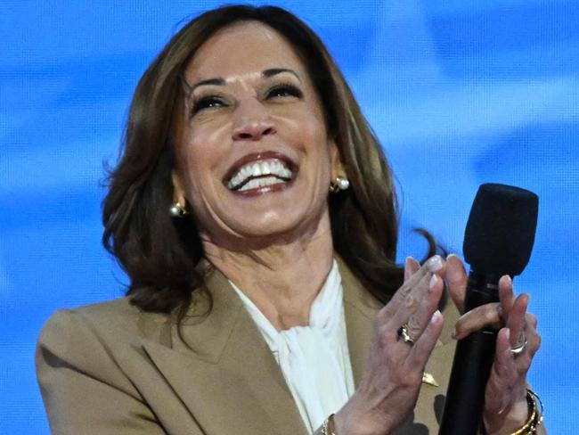 US Vice President and 2024 Democratic presidential candidate Kamala Harris arrives onstage to speak on the first day of the Democratic National Convention (DNC) at the United Center in Chicago, Illinois, on August 19, 2024. Vice President Kamala Harris will formally accept the partyâs nomination for president at the DNC which runs from August 19-22 in Chicago. (Photo by Mandel NGAN / AFP)