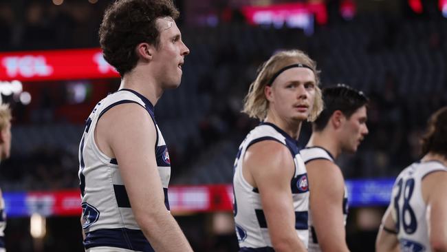 MELBOURNE, AUSTRALIA - AUGUST 17:  Dejected Geelong players walk from the ground after the round 23 AFL match between St Kilda Saints and Geelong Cats at Marvel Stadium, on August 17, 2024, in Melbourne, Australia. (Photo by Darrian Traynor/Getty Images)