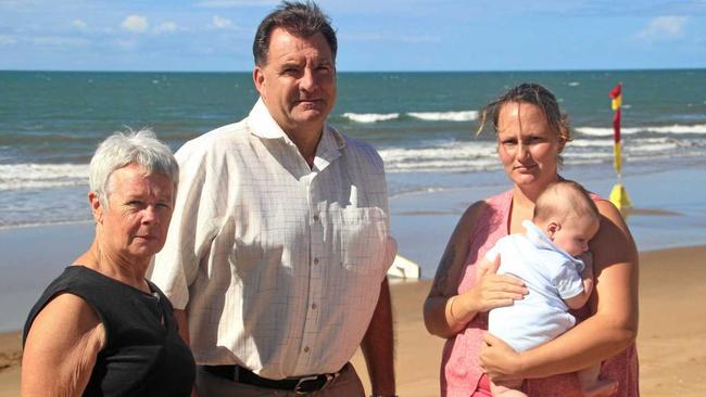 SAFETY BARRIERS: Cheryl Hay, Member for Burnett Stephen Bennett and Alicia Bauer (with her son Evan Bauer) are calling for safer swimming areas at Moore Park Beach. Picture: Contributed