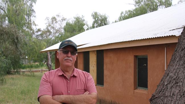 Alice Springs local historian Alex Nelson next to St Mary's chapel, which houses the heritage listed Robert Czako mural. Picture: Gera Kazakov