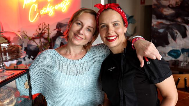 Anna Allison (left), the owner of the Lion and Buffalo cafe in South Coogee pictured with head chef Joice Rosa (right). Picture: Damian Shaw